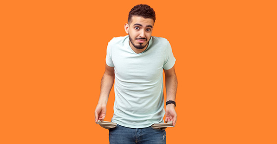 Man showing empty pockets