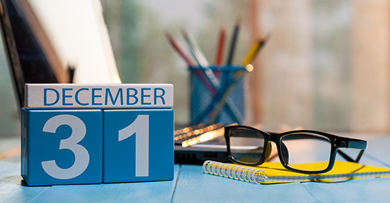 a desk with date blocks on December 31st
