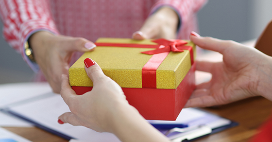 Passing a gift box