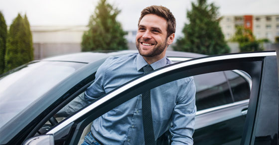 Man getting out of a car